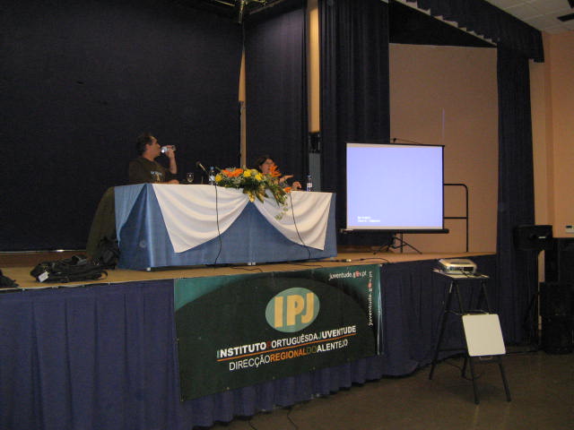 Pat wrestles the floral centerpiece during her talk